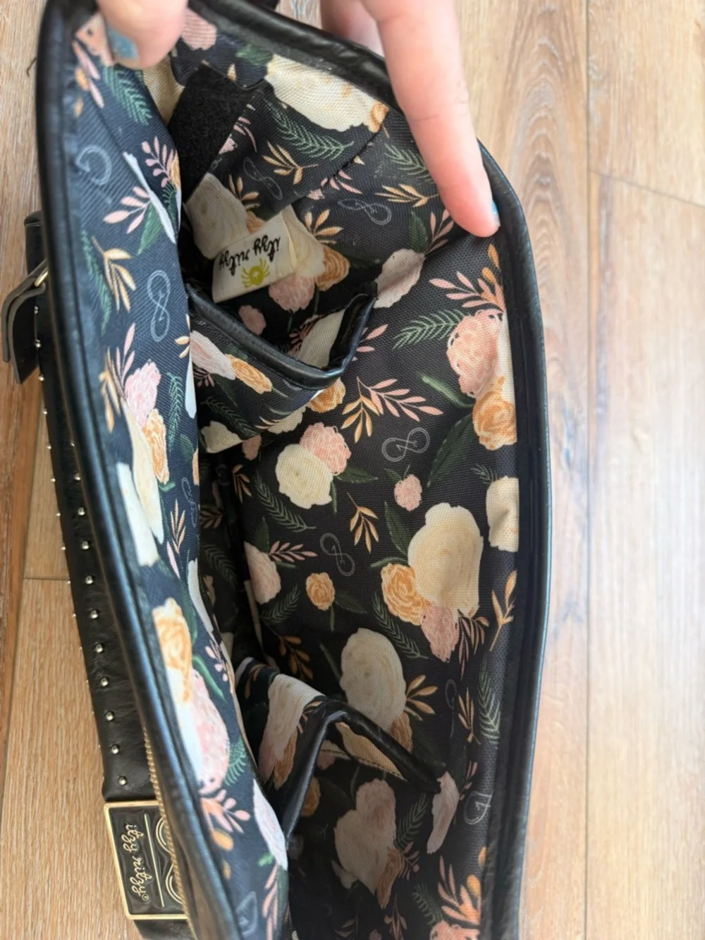 Itzy Ritzy Black Studded Crossbody Baby Bag with Gold Accents
